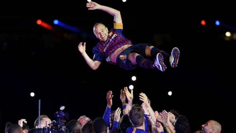 Iniesta ends Barca career with win