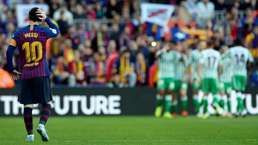 Barca stunned by Betis despite Messi return