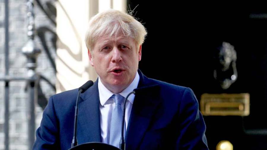 Boris Johnson overhauls cabinet on first day as PM