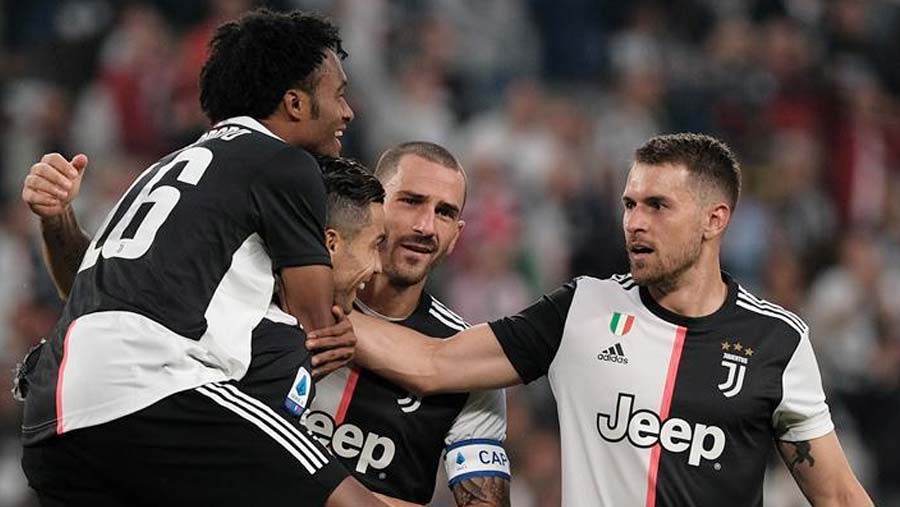 Ramsey and Ronaldo help Juventus beat Verona