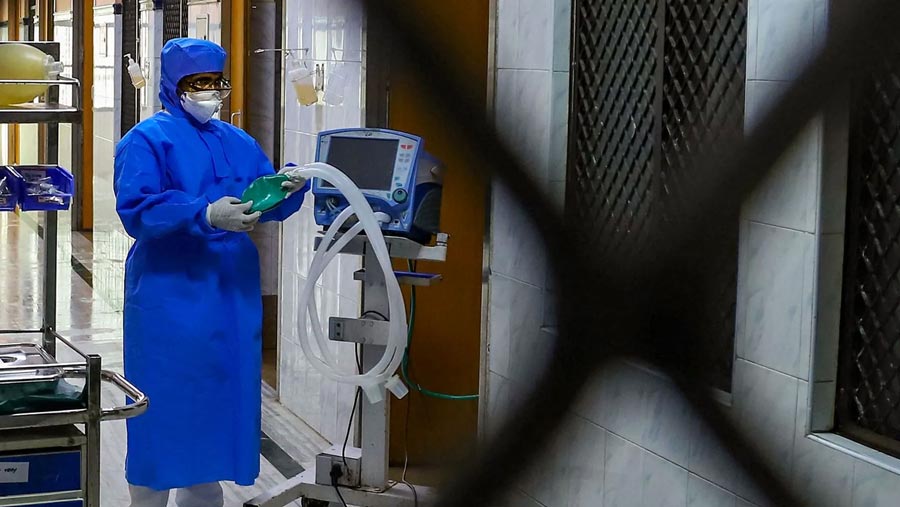 Virus cases in China fall again as deaths top 2,000