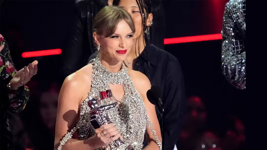 Swift wins top MTV video award, announces new album