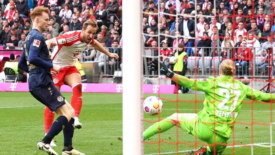 Kane nets hat-trick as Bayern humble Mainz